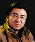 梁健